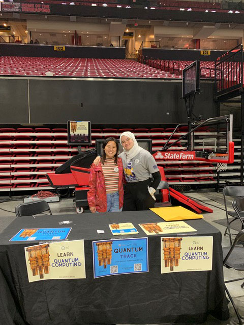 Jade LeSchack and Sondos Quqandi, the UQA Vice President and a UMD physics major, at an informational table for the quantum track of Bitcamp 2021. Image credit: Dhruv Srinivasan
