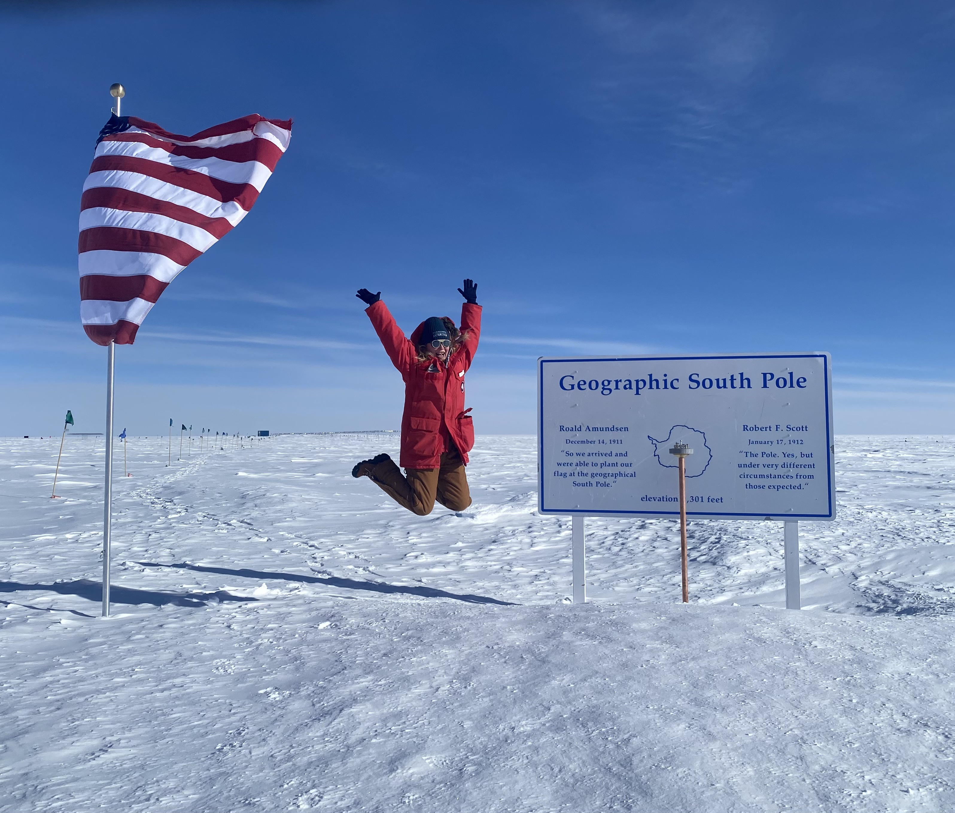 Rachel Procter-Murphy leaps for joy at the South Pole. Photo courtesy of same.