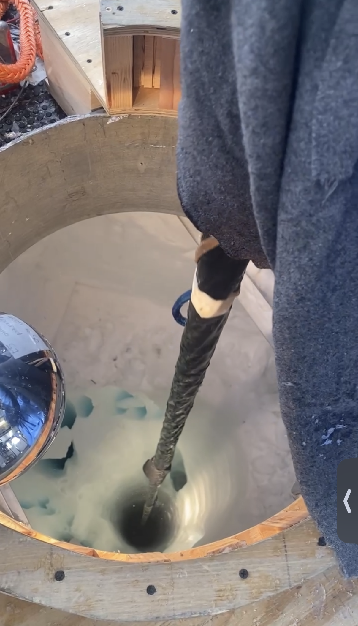 Drilling into the ice to install a new string of neutrino sensors at the IceCube observatory. Photo courtesy of Rachel Procter-Murphy.