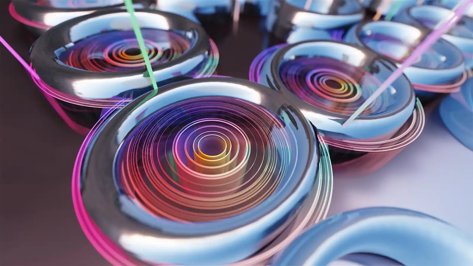 A new chip with hundreds of microscopic rings generated the first topological frequency comb. (Credit: E. Edwards)